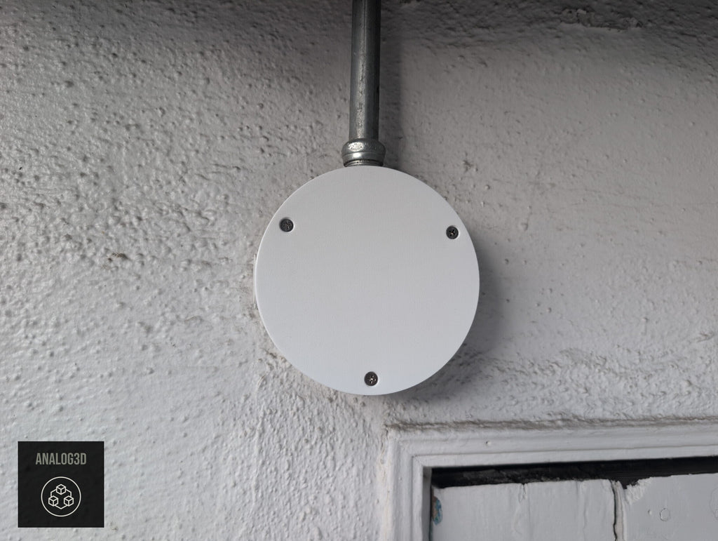 Blank cover plate installed on a Dahua PFA137 junction box (customer install photo)