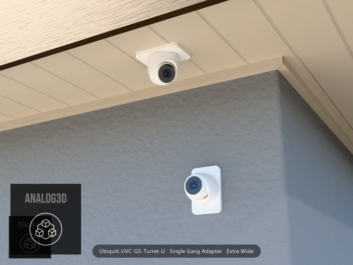 UVC-G5-Turret-U single-gang extra-wide adapter plate installed on a stucco wall and soffit