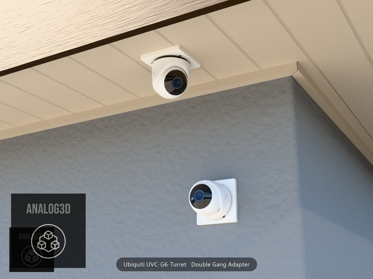 UVC-G6-Turret double-gang adapter plate installed on a stucco wall and soffit