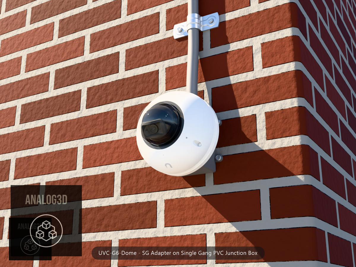 UVC-G6-Dome SG adapter plate bolted to a single gang PVC junction box with 1/2 inch PVC conduit, brick wall
