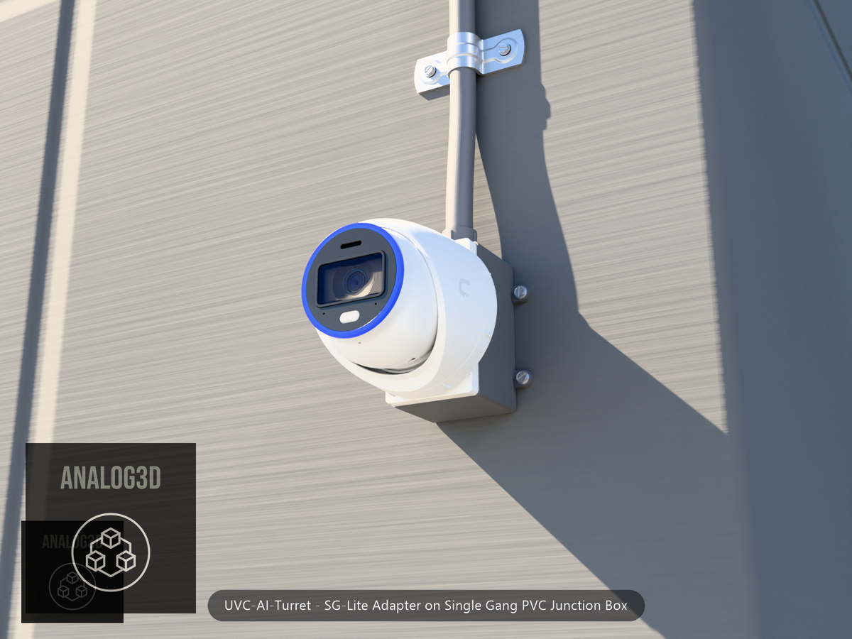 UVC-AI-Turret SG-Lite adapter plate bolted to a single gang PVC junction box, concrete wall
