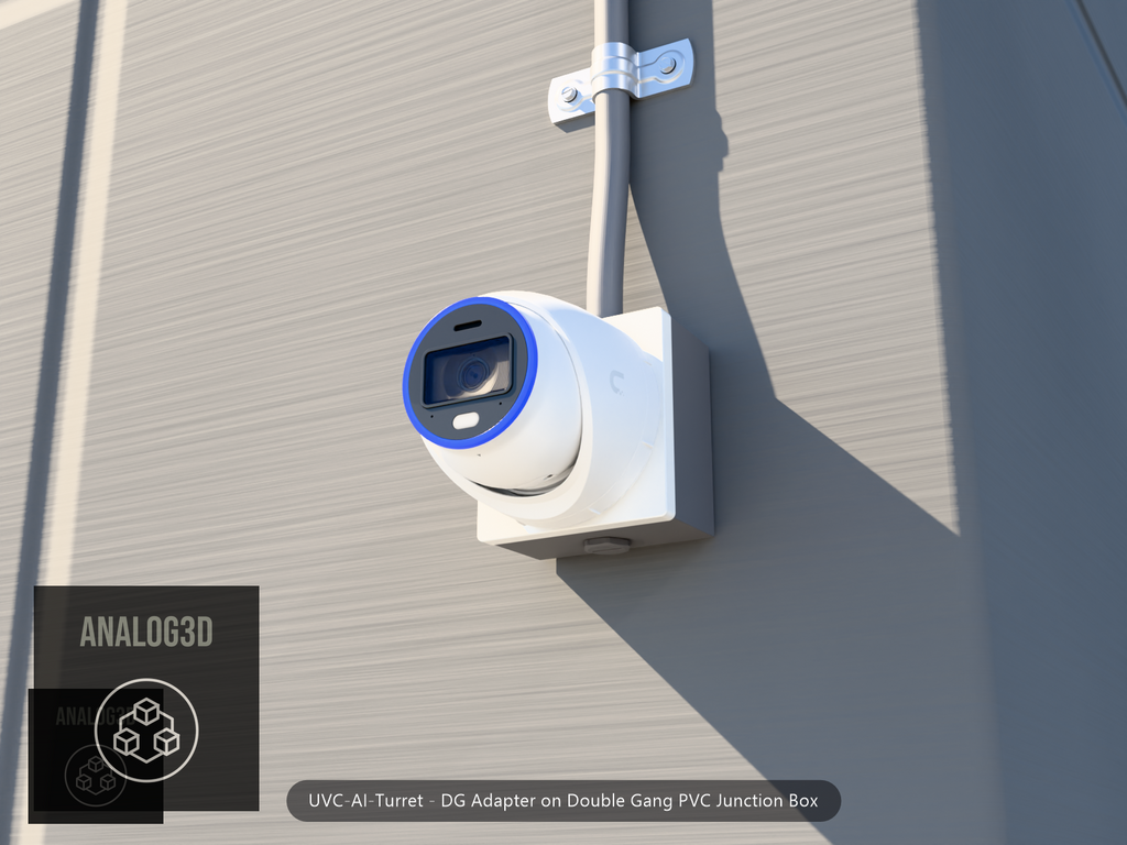 UVC-AI-Turret DG adapter plate bolted to a double gang PVC junction box, 1/2 inch PVC conduit from the top hub, threaded plug in the bottom hub, concrete wall