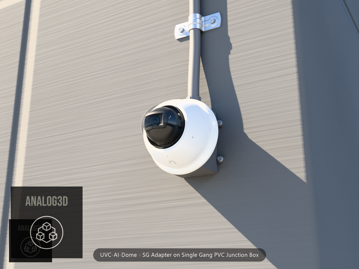 UVC-AI-Dome SG adapter plate bolted to a single gang PVC junction box, concrete wall