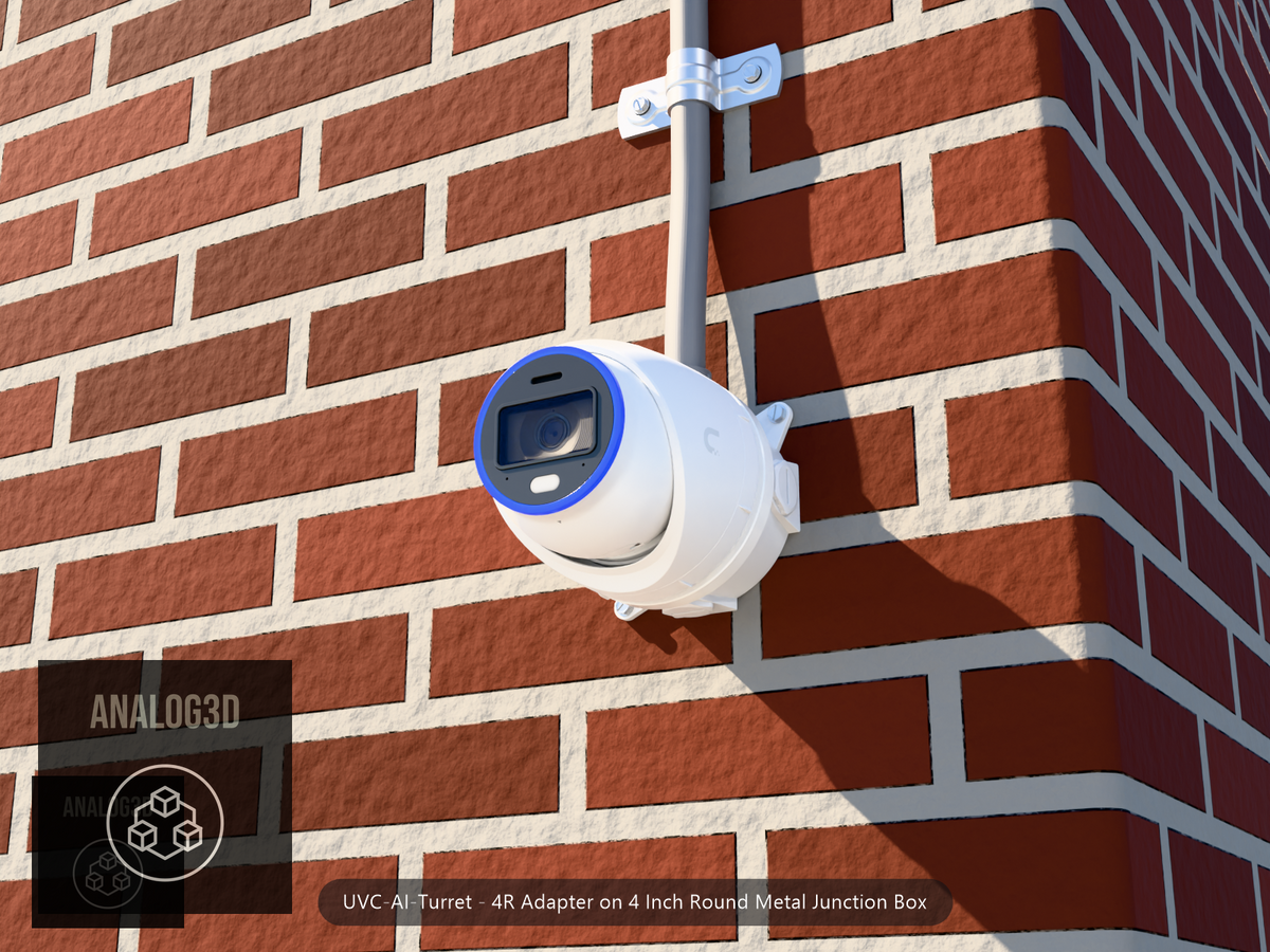 UVC-AI-Turret 4R adapter plate bolted to a 4 inch round metal junction box, 1/2 inch PVC conduit from the top hub, threaded plugs in the remaining hubs, brick wall