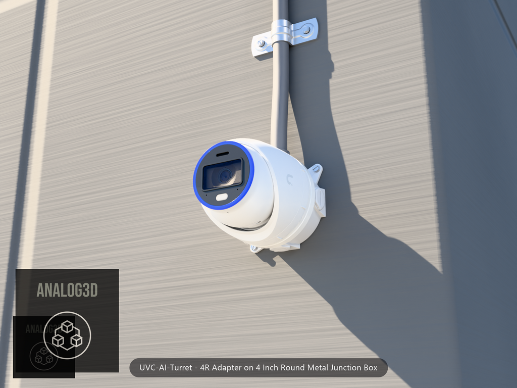 UVC-AI-Turret 4R adapter plate bolted to a 4 inch round metal junction box, 1/2 inch PVC conduit from the top hub, threaded plugs in the remaining hubs, concrete wall
