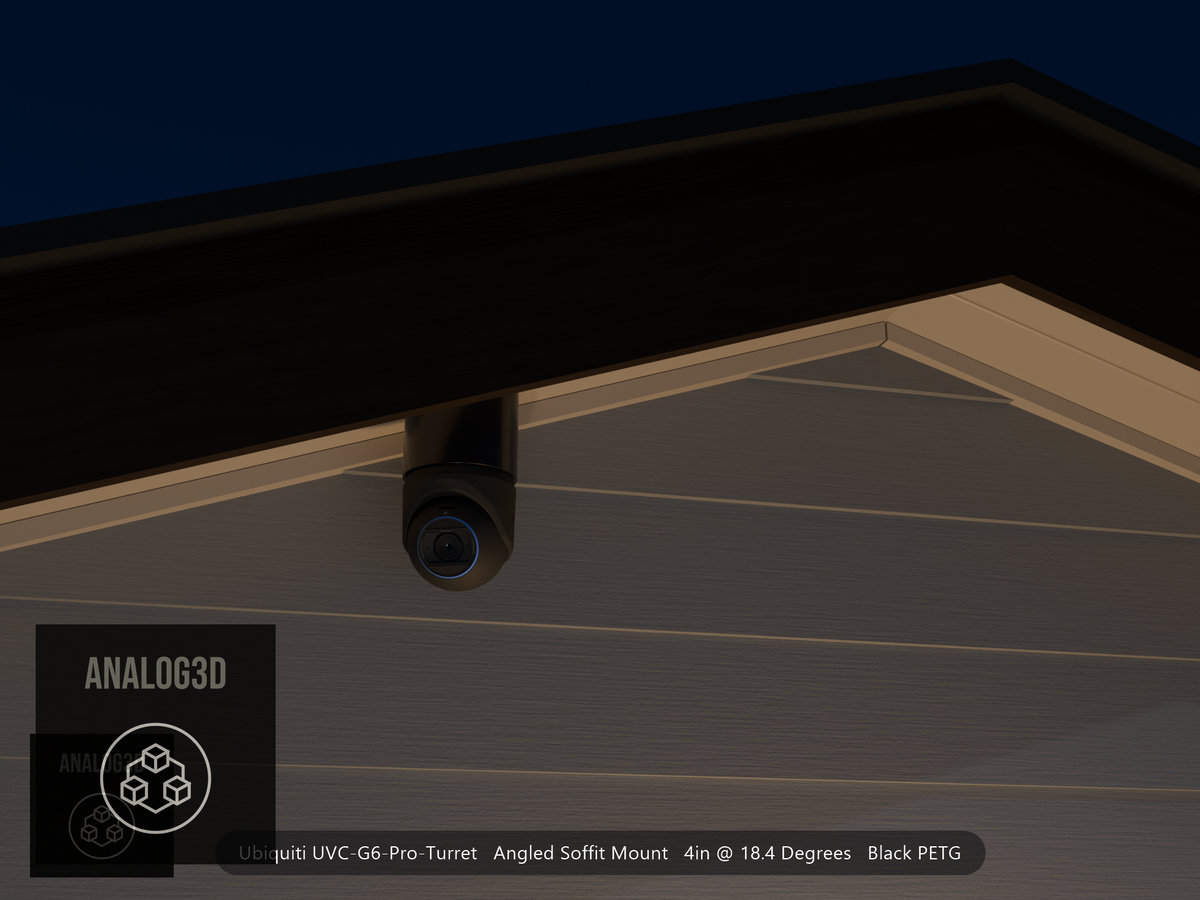 Ubiquiti UVC-G6-Pro-Turret black edition on black PETG angled soffit mount under a gable eave at night, 4in extension at 4/12 pitch
