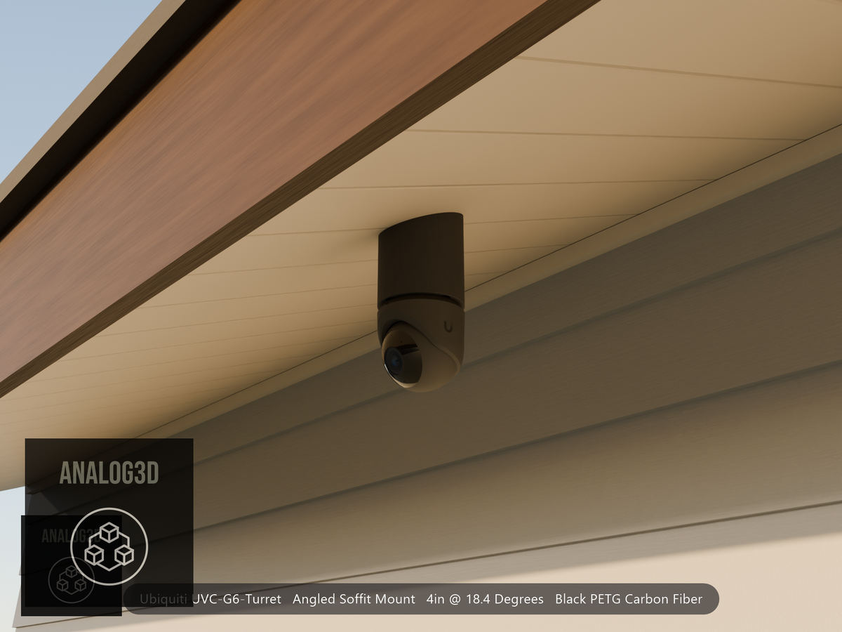 Ubiquiti UVC-G6-Turret black edition on black PETG carbon fiber angled soffit mount under a soffit at golden hour