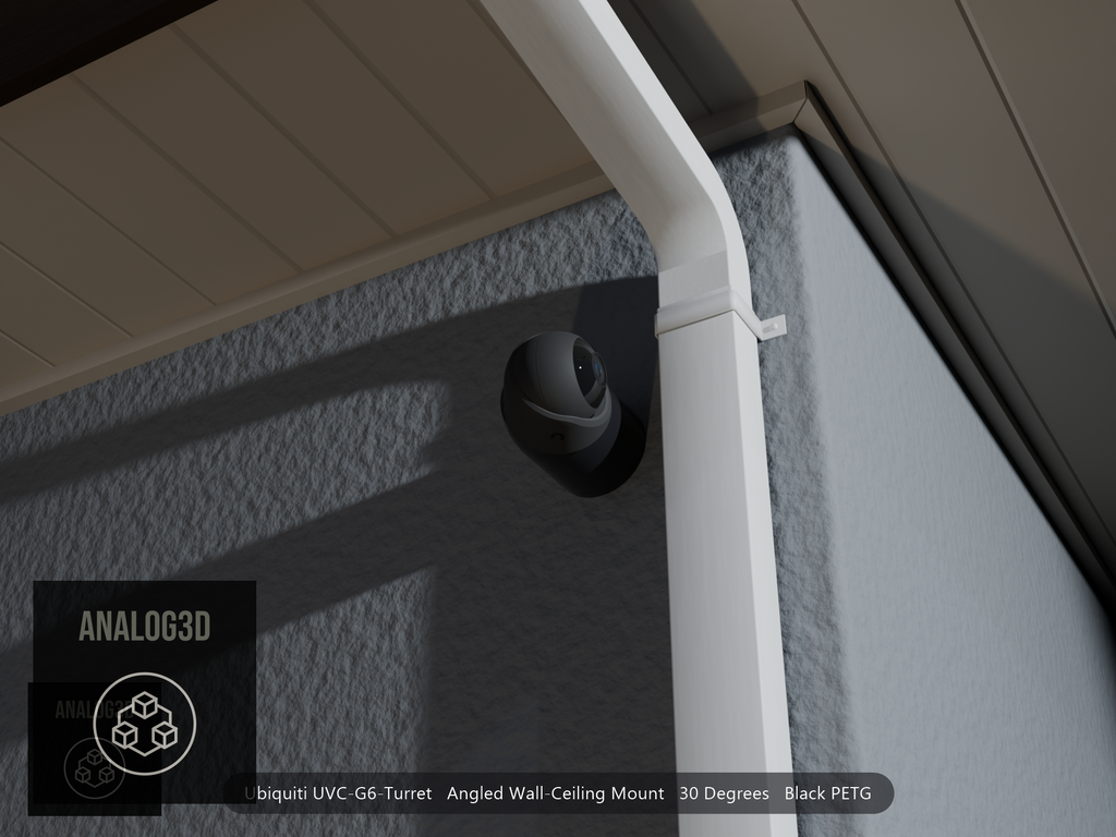 Ubiquiti UVC-G6-Turret on black PETG angled wall mount extending past a downspout on a stucco wall at night