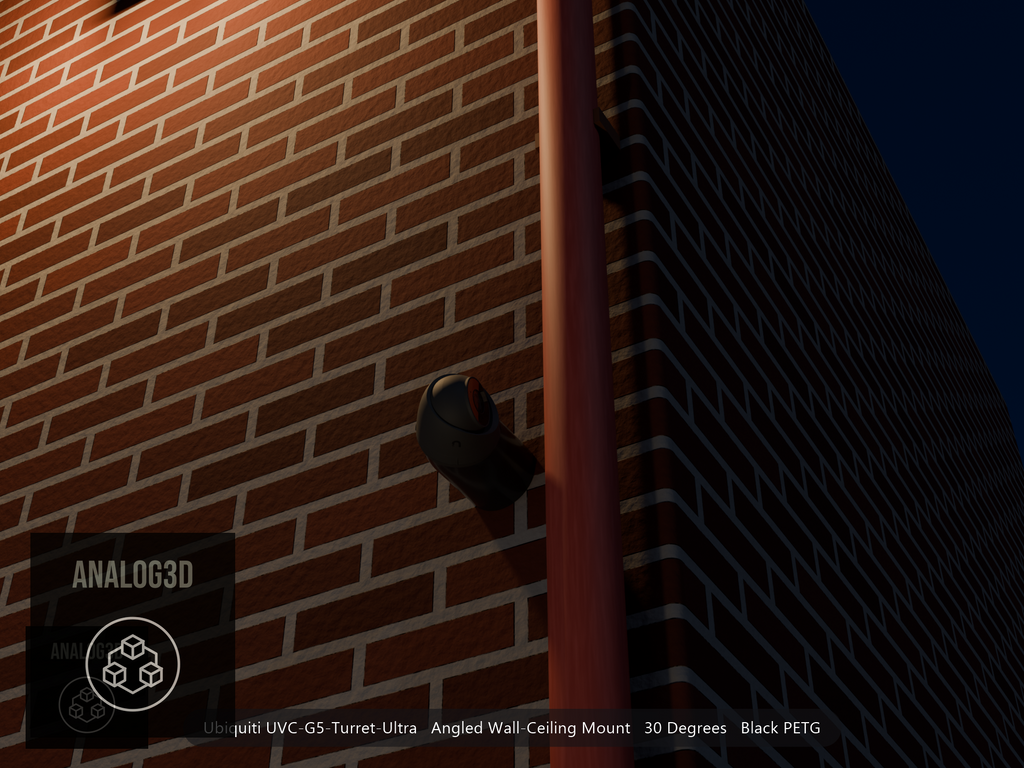 Ubiquiti UVC-G5-Turret-Ultra on black PETG angled wall mount extending past a downspout on a brick wall at night