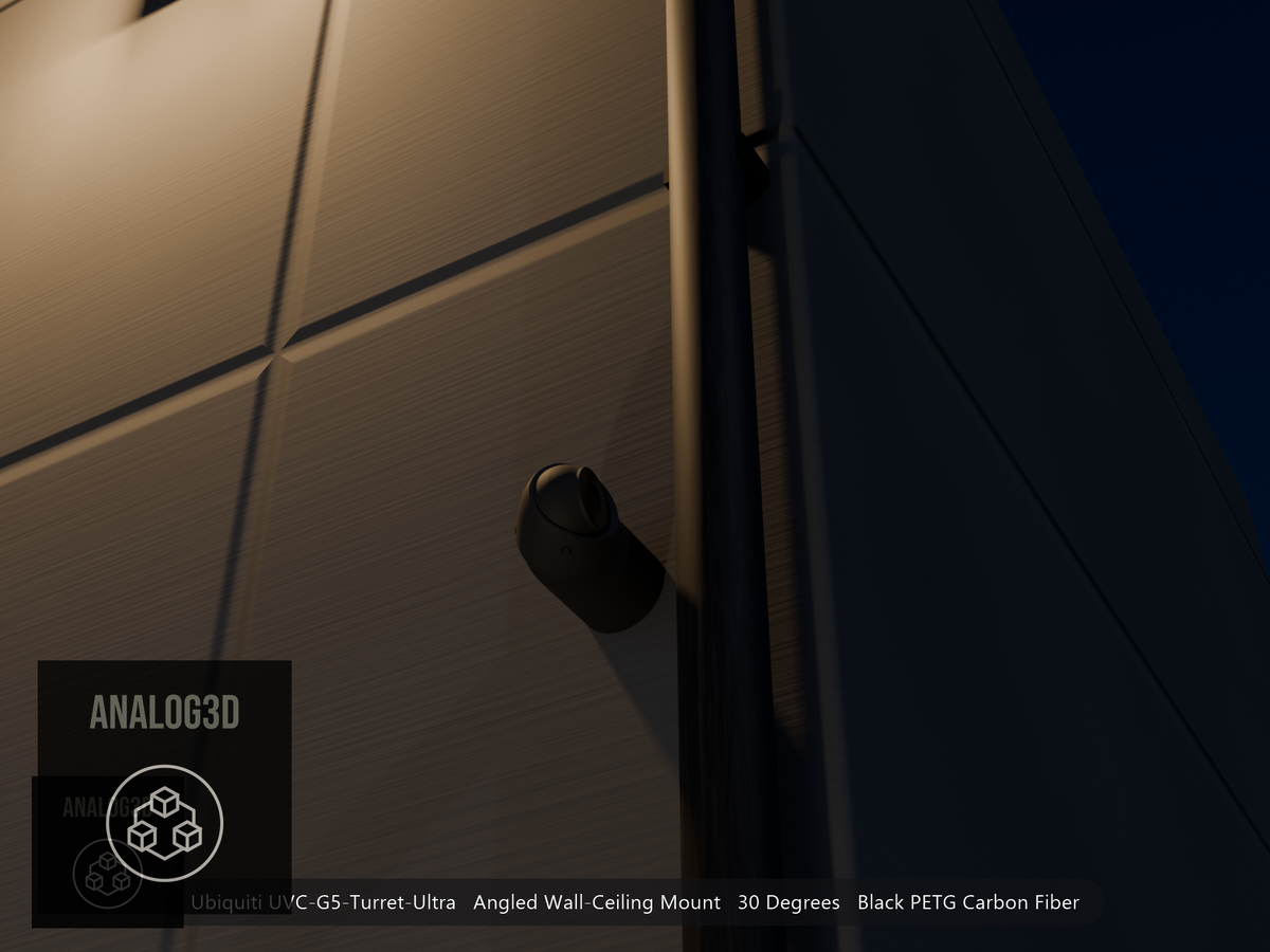 Ubiquiti UVC-G5-Turret-Ultra on black PETG carbon fiber angled wall mount extending past a downspout on a concrete wall at night