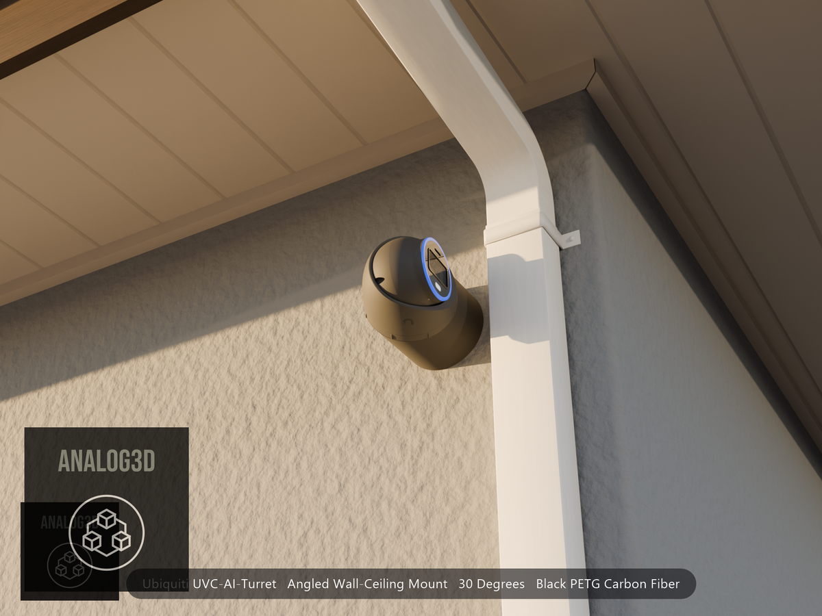Ubiquiti UVC-AI-Turret on black PETG carbon fiber angled wall mount extending past a downspout on a stucco wall at golden hour
