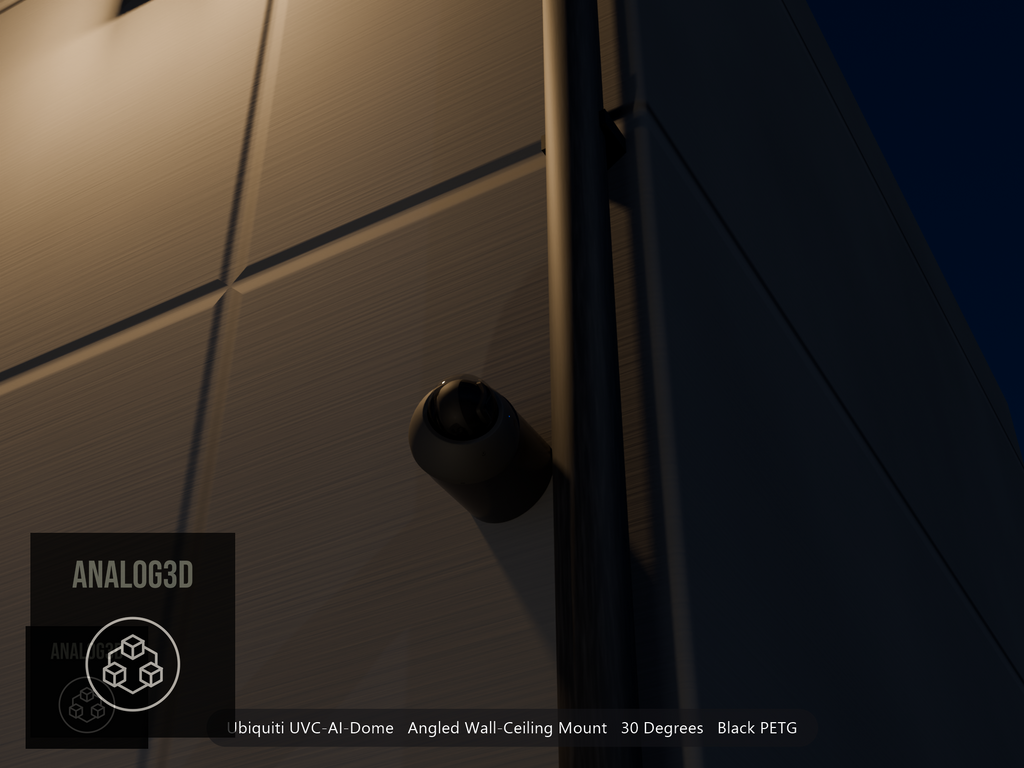 Ubiquiti UVC-AI-Dome on black PETG angled wall mount extending past a downspout on a concrete wall at night