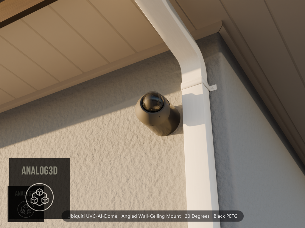 Ubiquiti UVC-AI-Dome on black PETG angled wall mount extending past a downspout on a stucco wall at golden hour