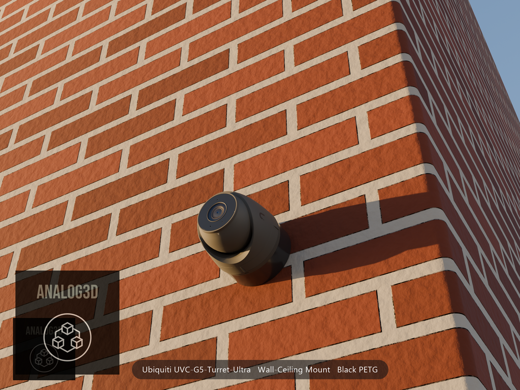 Ubiquiti UVC-G5-Turret-Ultra on black PETG wall-ceiling mount on a brick wall at golden hour
