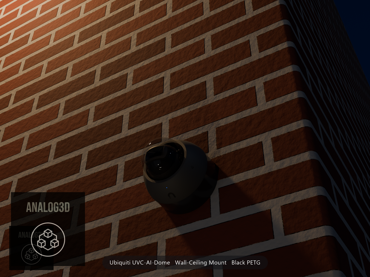 Ubiquiti UVC-AI-Dome on black PETG wall-ceiling mount on a brick wall at night