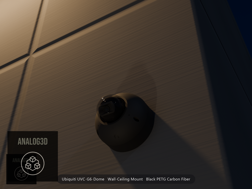 Ubiquiti UVC-G6-Dome on black PETG carbon fiber wall-ceiling mount on a concrete wall at night