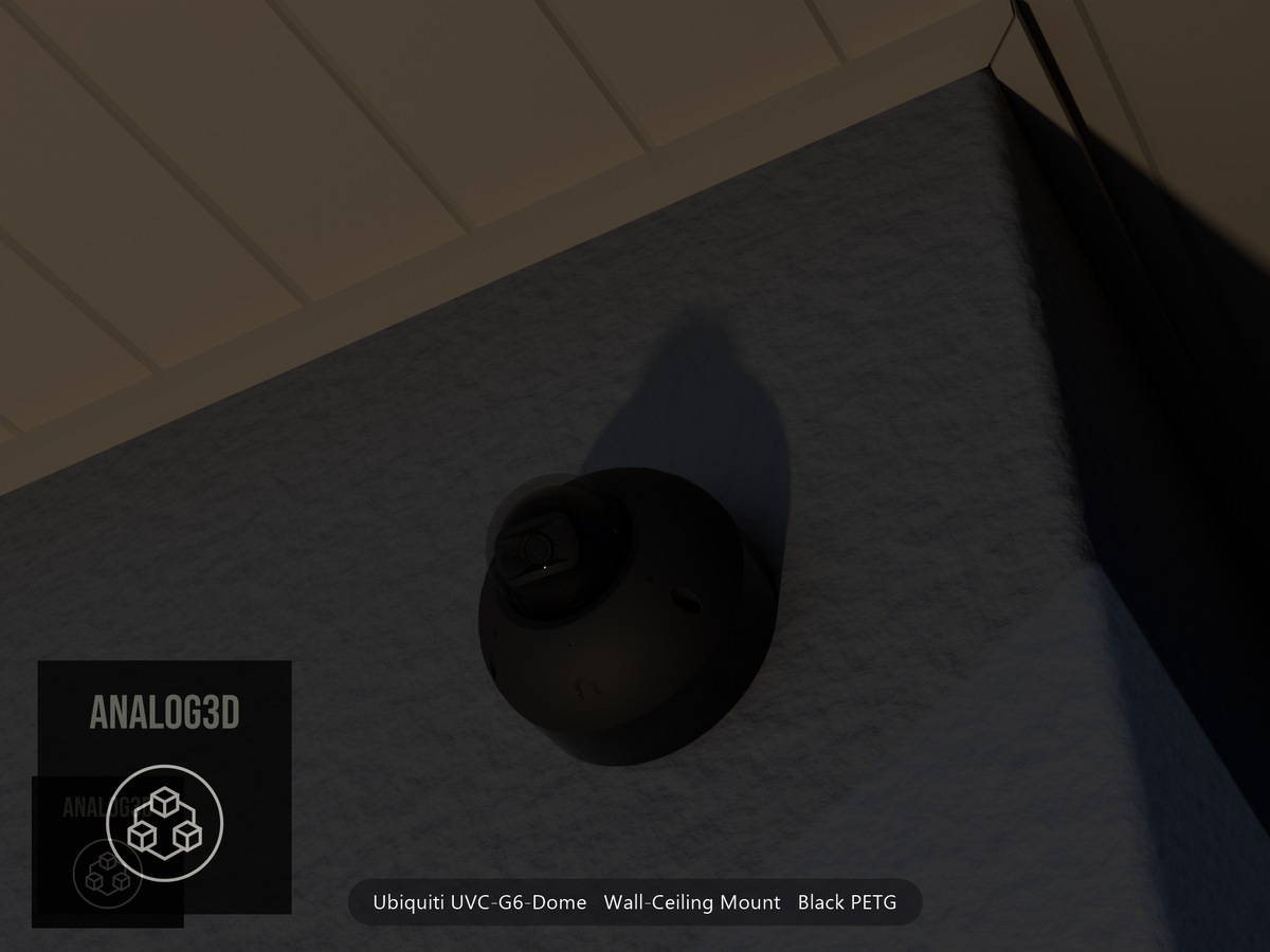 Ubiquiti UVC-G6-Dome on black PETG wall-ceiling mount on a stucco wall at night