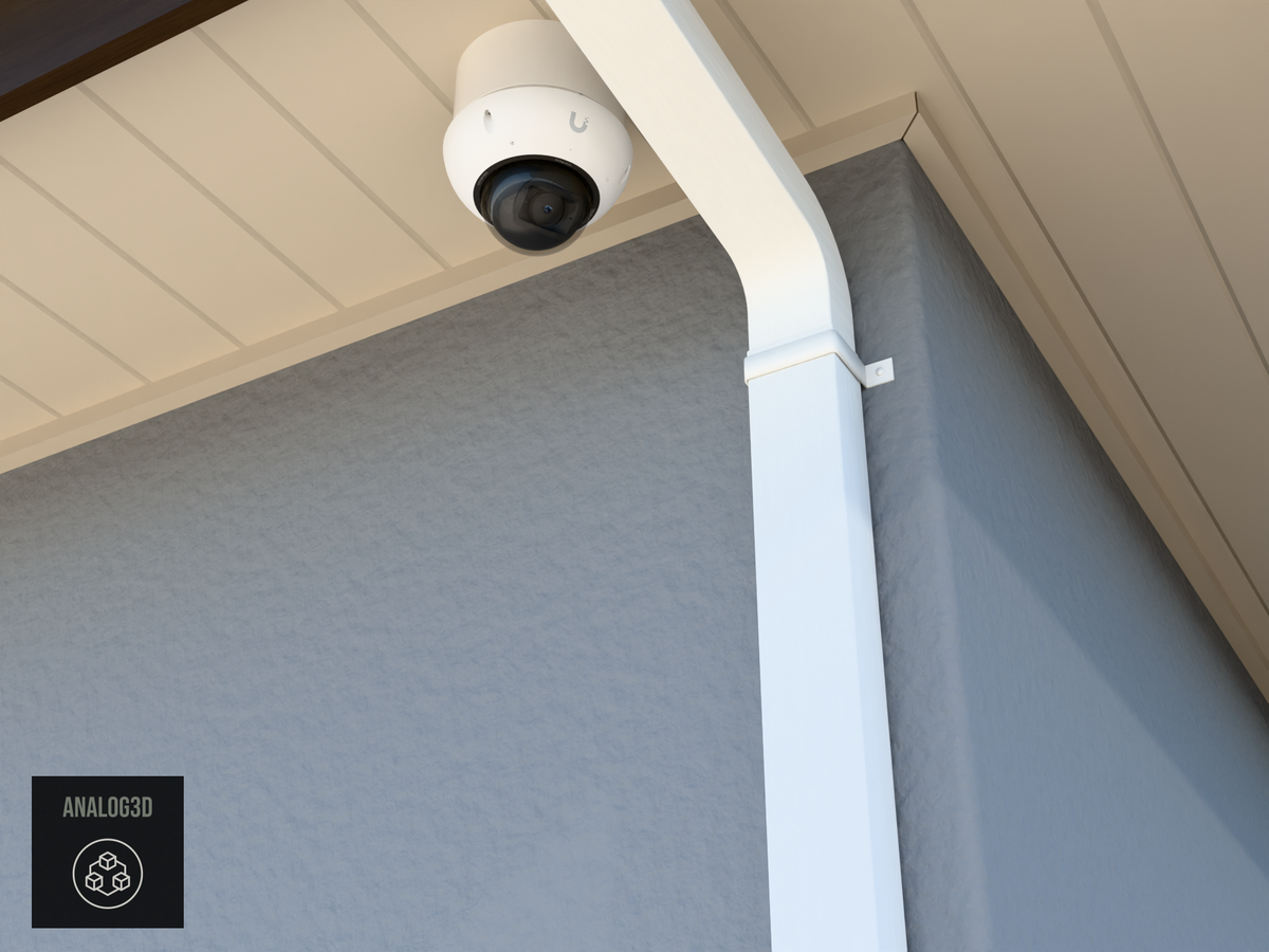 UVC-G6-Edge-Dome heavy duty wall-ceiling mount (3in ext3) hung from the soffit beside a swan-neck downspout