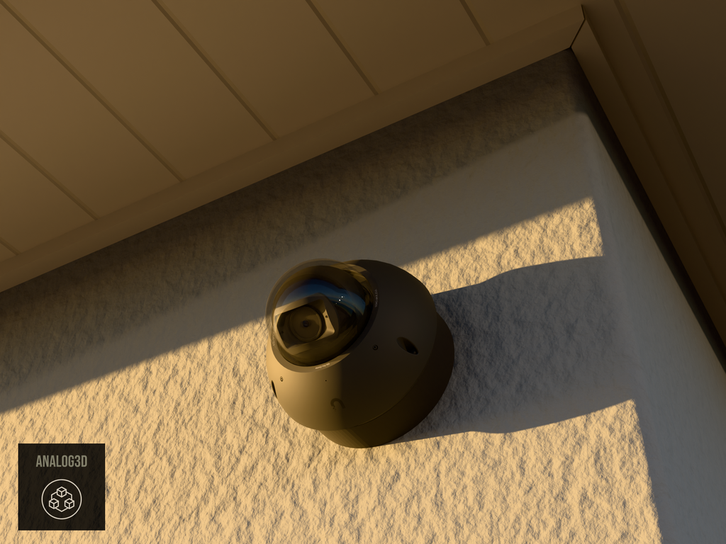 Ubiquiti UVC-G6-Pro-Dome black edition on black PETG carbon fiber heavy duty wall-ceiling mount on a stucco wall at golden hour