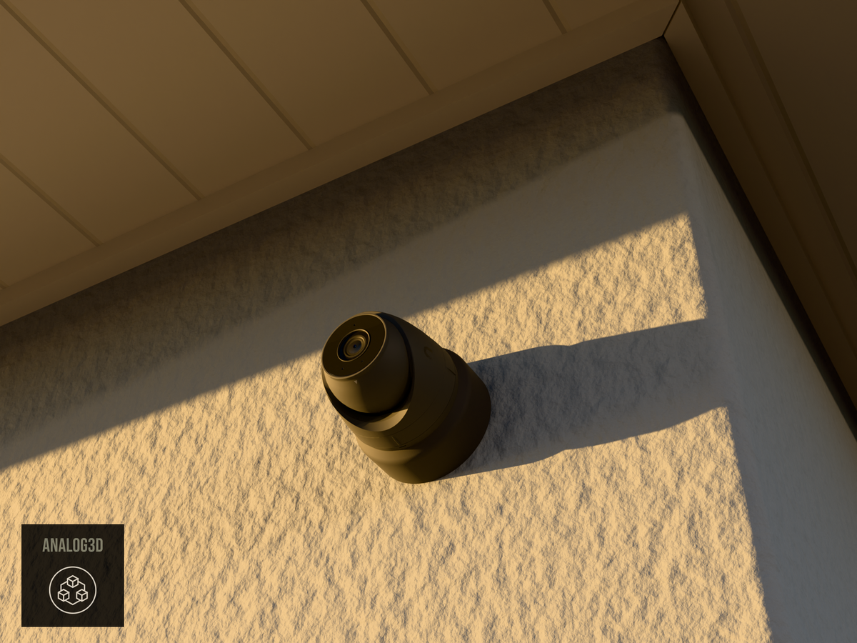 Ubiquiti UVC-G5-Turret-Ultra on black PETG carbon fiber wall-ceiling mount on a stucco wall at golden hour