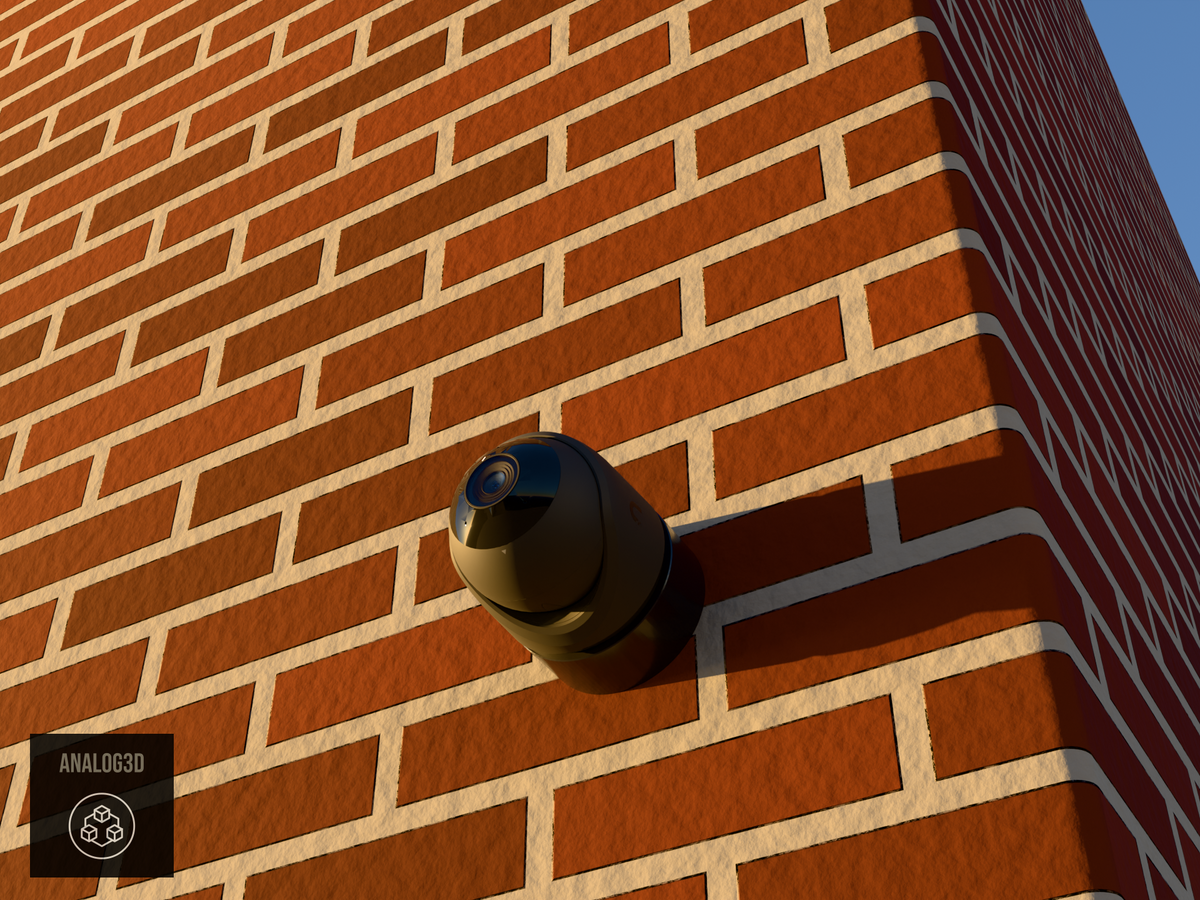 Ubiquiti UVC-G6-Turret on black PETG wall-ceiling mount on a brick wall at golden hour