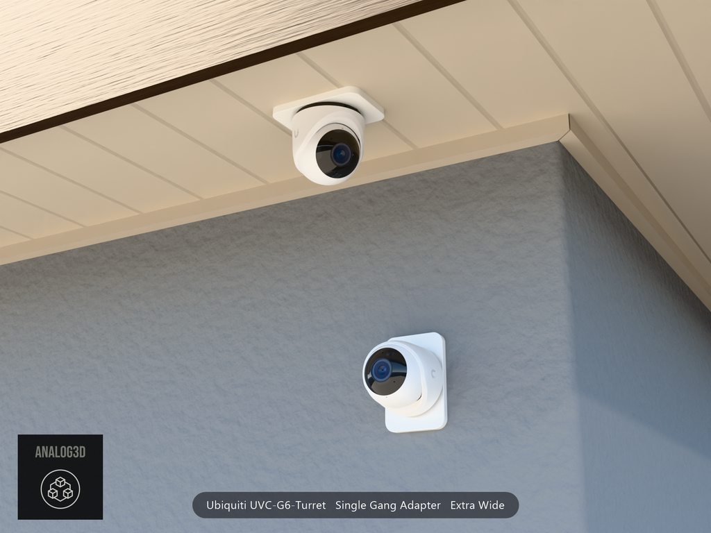 UVC-G6-Turret single-gang extra-wide adapter plate installed on a stucco wall and soffit