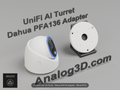 White PETG Dahua PFA136 adapter plate for the Ubiquiti UVC-AI-Turret on a display stand with the camera