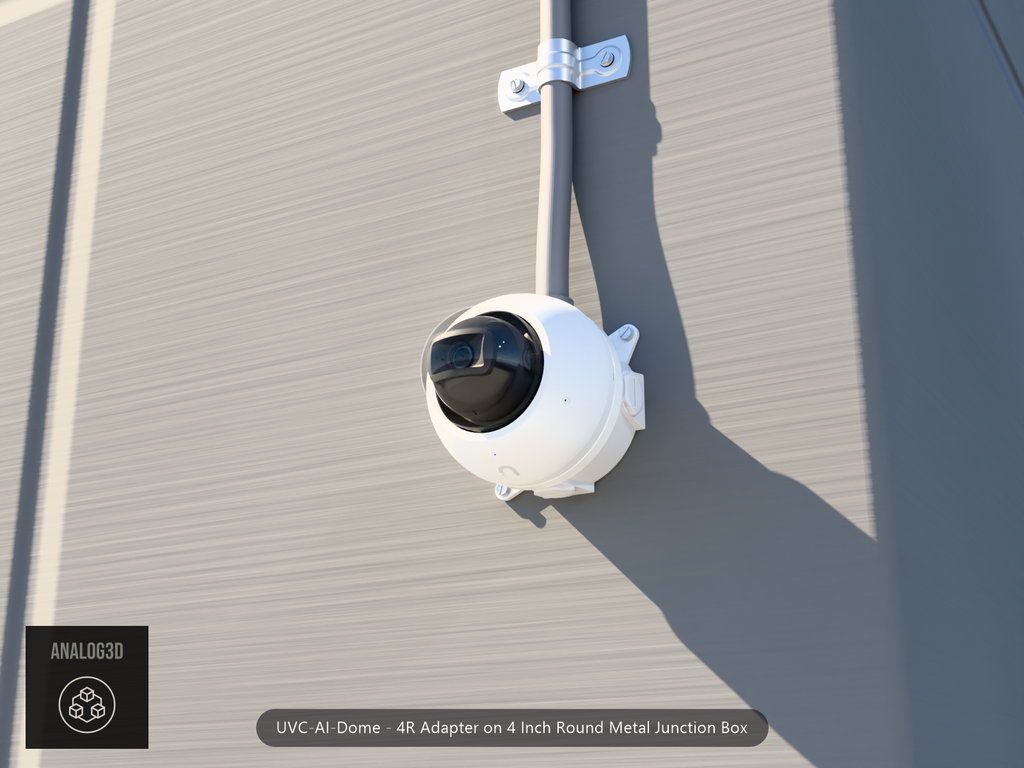 UVC-AI-Dome 4R adapter plate bolted to a 4 inch round metal junction box, 1/2 inch PVC conduit from the top hub, threaded plugs in the remaining hubs, concrete wall