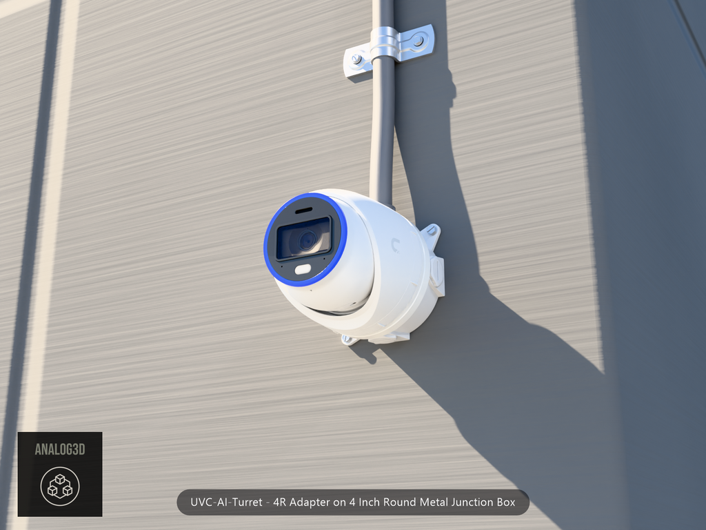 UVC-AI-Turret 4R adapter plate bolted to a 4 inch round metal junction box, 1/2 inch PVC conduit from the top hub, threaded plugs in the remaining hubs, concrete wall