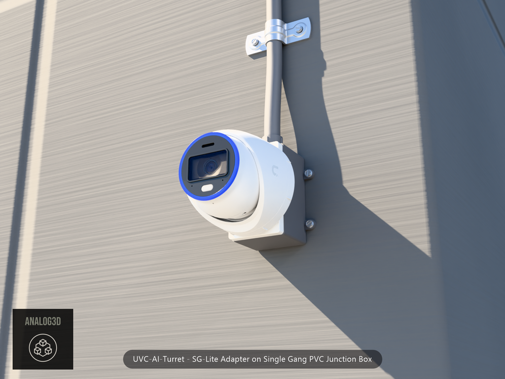 UVC-AI-Turret SG-Lite adapter plate bolted to a single gang PVC junction box, concrete wall