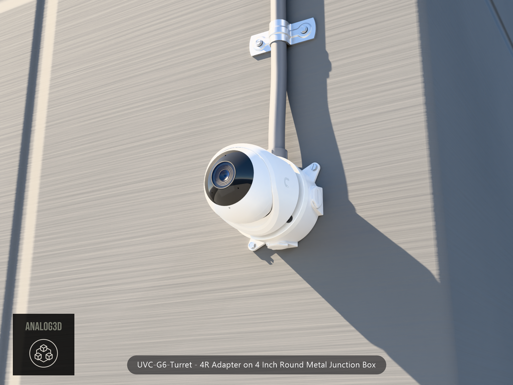 UVC-G6-Turret 4R adapter plate bolted to a 4 inch round metal junction box, 1/2 inch PVC conduit from the top hub, threaded plugs in the remaining hubs, concrete wall