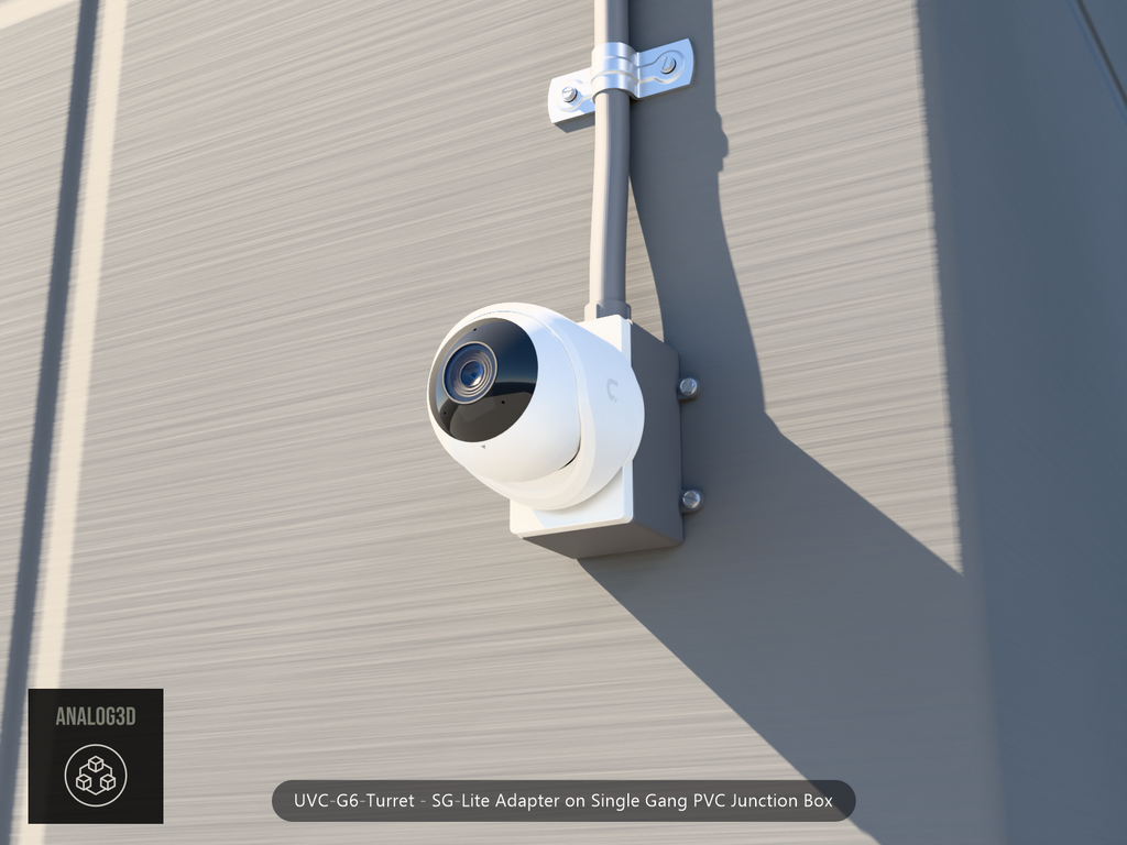 UVC-G6-Turret SG-Lite adapter plate bolted to a single gang PVC junction box, concrete wall