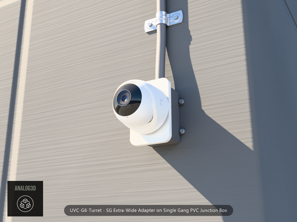 UVC-G6-Turret SG Extra-Wide adapter plate bolted to a single gang PVC junction box, concrete wall