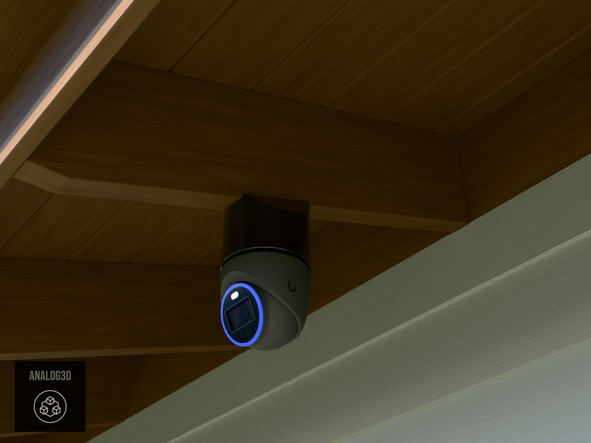 Ubiquiti UVC-AI-Turret black edition on black PETG angled rafter tail mount installed on an exposed rafter tail in daylight, 4in extension at 4/12 pitch