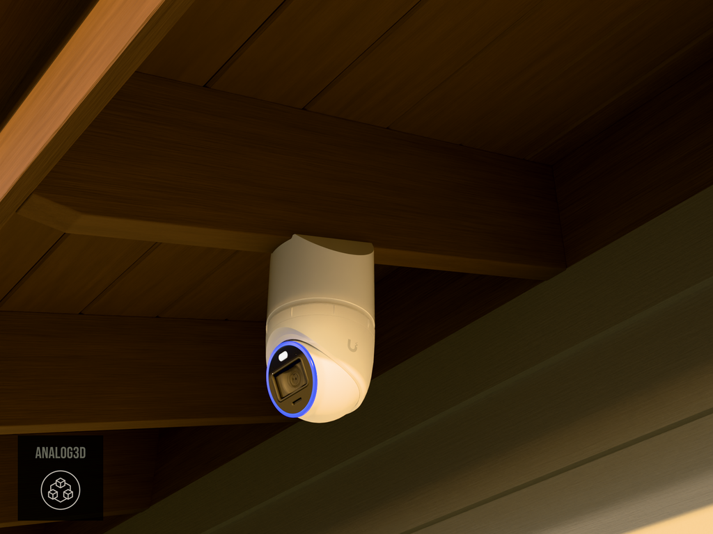 Ubiquiti UVC-AI-Turret on white PETG angled rafter tail mount installed on an exposed rafter tail at golden hour, 4in extension at 4/12 pitch