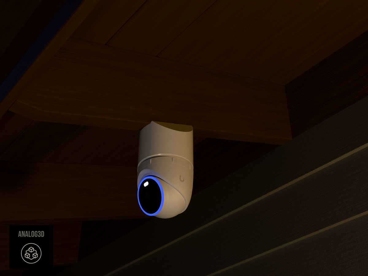 Ubiquiti UVC-AI-Turret on white PETG angled rafter tail mount installed on an exposed rafter tail at night, 4in extension at 4/12 pitch