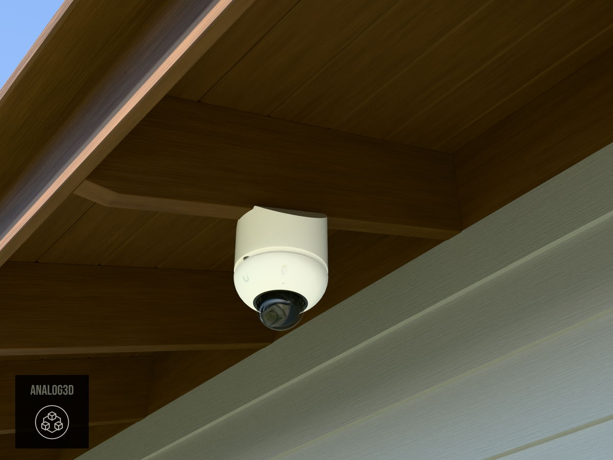 Ubiquiti UVC-G6-Dome on white PETG angled rafter tail mount installed on an exposed rafter tail in daylight, 4in extension at 4/12 pitch