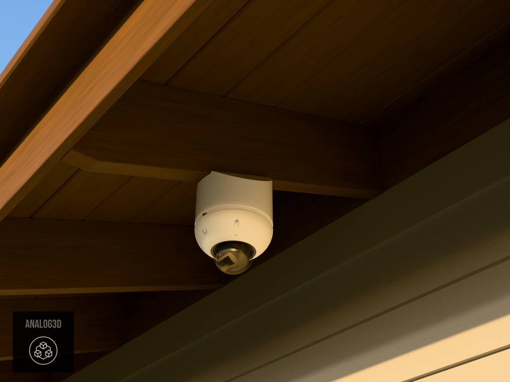 Ubiquiti UVC-G6-Dome on white PETG angled rafter tail mount installed on an exposed rafter tail at golden hour, 4in extension at 4/12 pitch