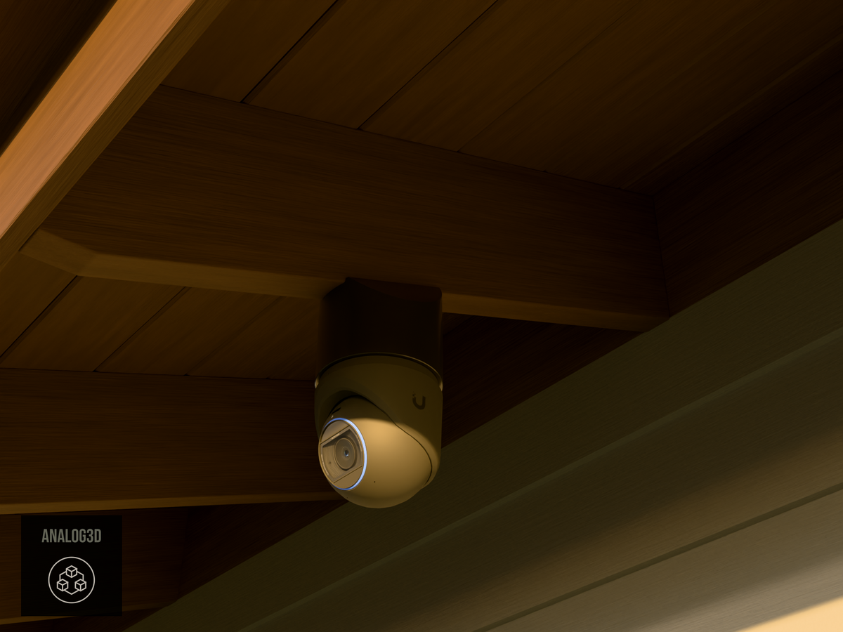 Ubiquiti UVC-G6-Pro-Turret black edition on black PETG angled rafter tail mount installed on an exposed rafter tail at golden hour, 4in extension at 4/12 pitch
