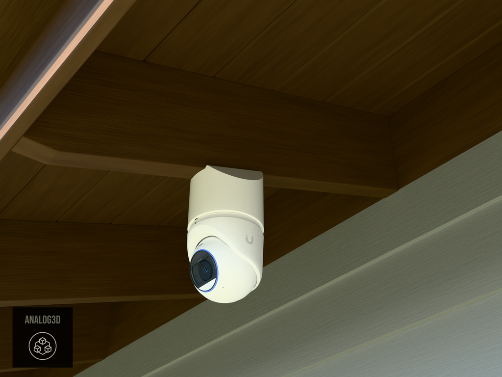 Ubiquiti UVC-G6-Pro-Turret on white PETG angled rafter tail mount installed on an exposed rafter tail in daylight, 4in extension at 4/12 pitch