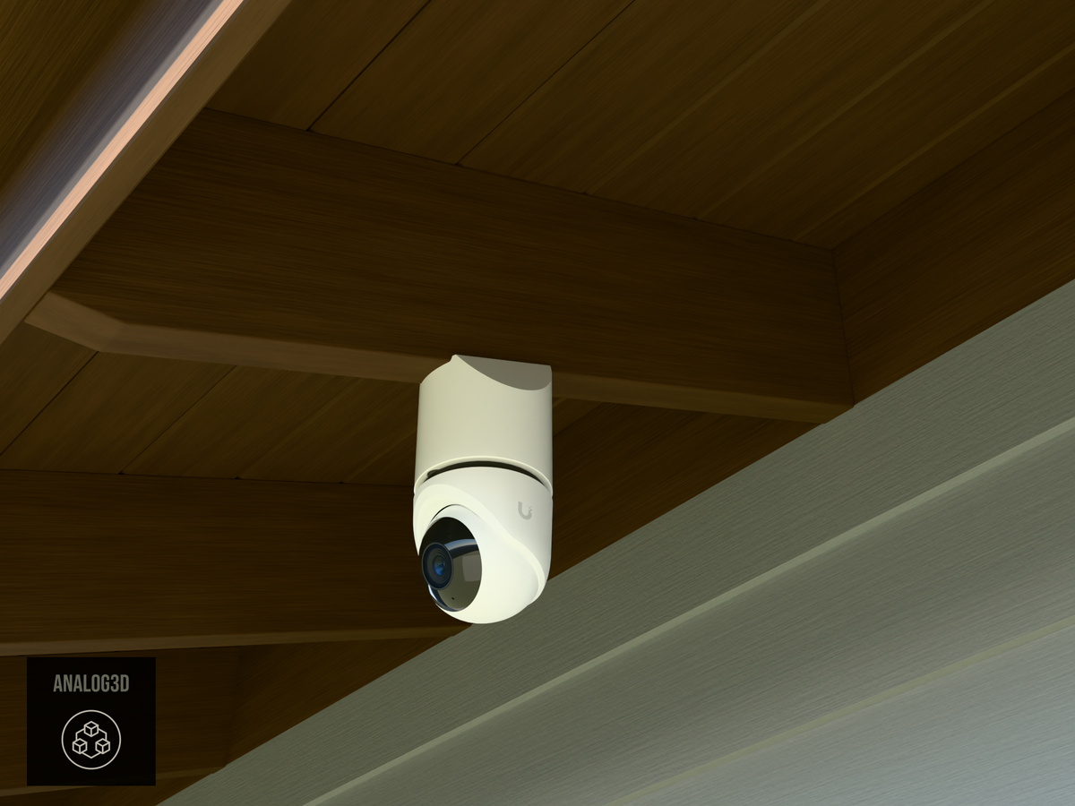 Ubiquiti UVC-G6-Turret on white PETG angled rafter tail mount installed on an exposed rafter tail in daylight, 4in extension at 4/12 pitch