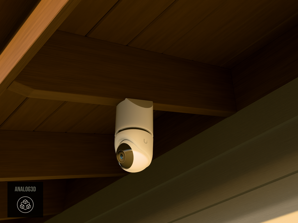 Ubiquiti UVC-G6-Turret on white PETG angled rafter tail mount installed on an exposed rafter tail at golden hour, 4in extension at 4/12 pitch