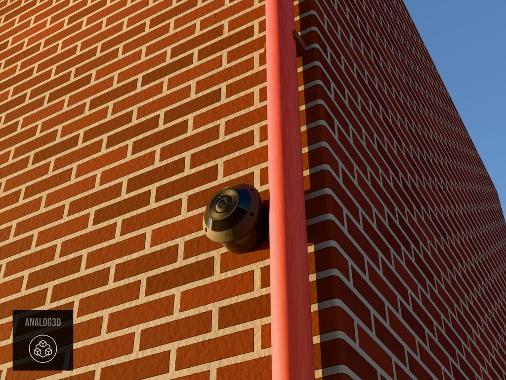 UniFi G6 Pro 360 wall-ceiling mount installed on a brick wall beside a drain pipe, Black PETG, golden hour