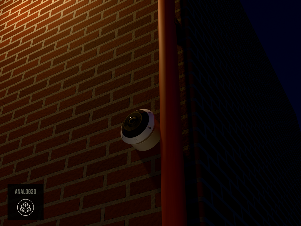 UniFi G6 Pro 360 wall-ceiling mount installed on a brick wall beside a drain pipe, White PETG, night