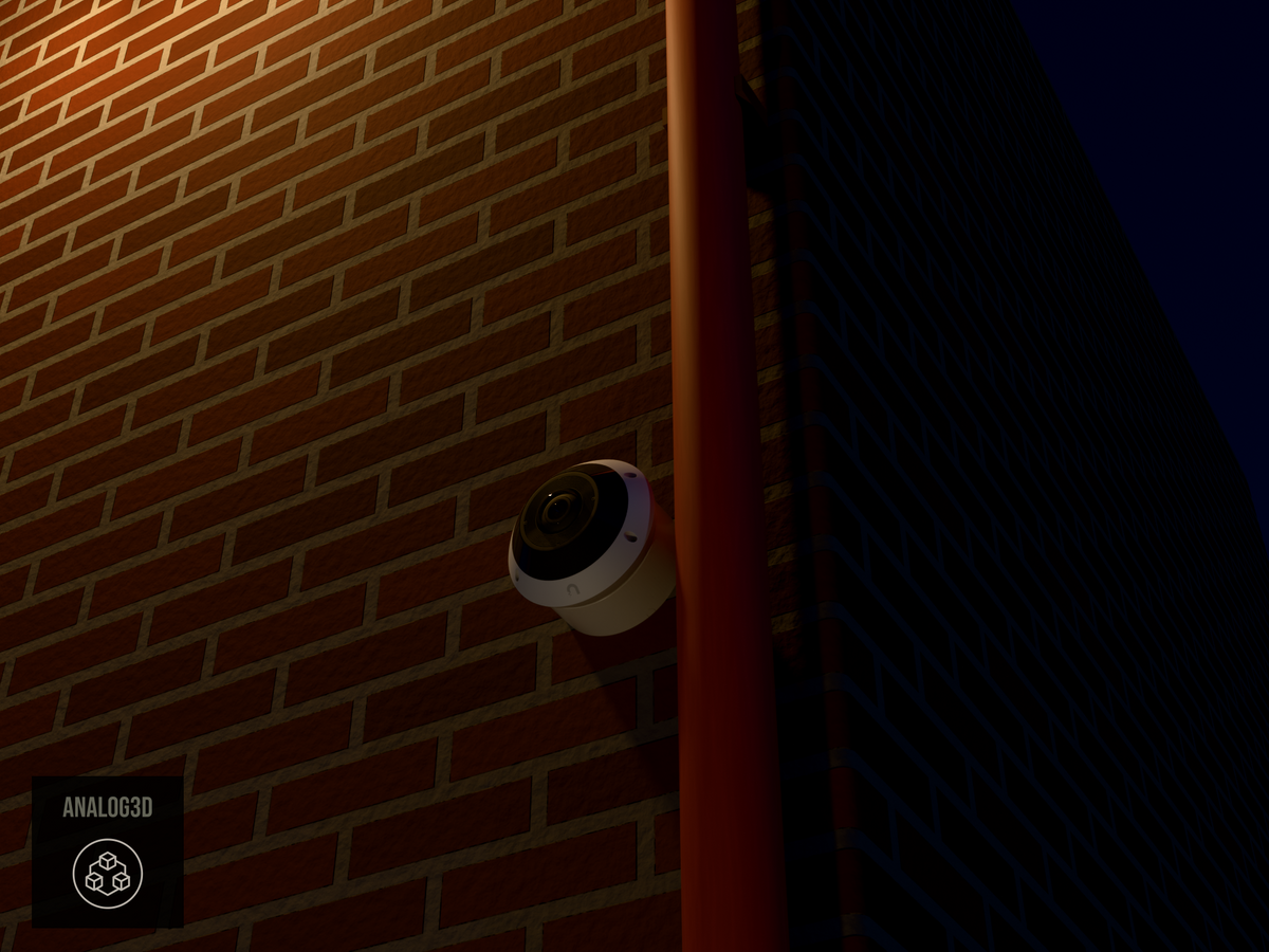 UniFi G6 Pro 360 wall-ceiling mount installed on a brick wall beside a drain pipe, White PETG, night