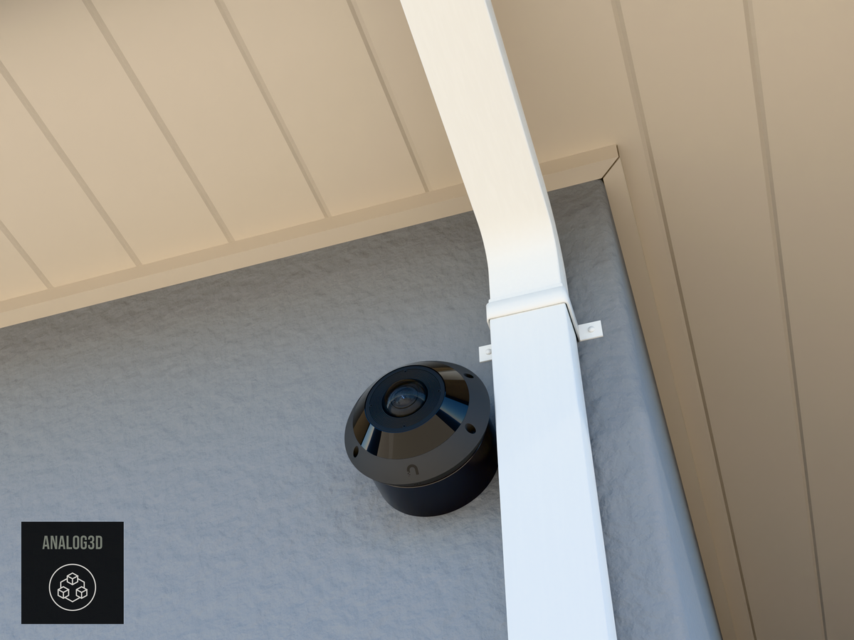 UniFi G6 Pro 360 wall-ceiling mount installed on a stucco wall beside a downspout, Black PETG, daylight