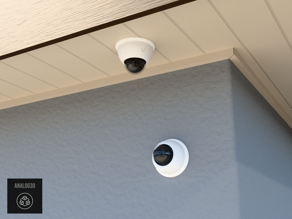 UVC-AI-Dome single-gang adapter plate installed on a stucco wall and soffit